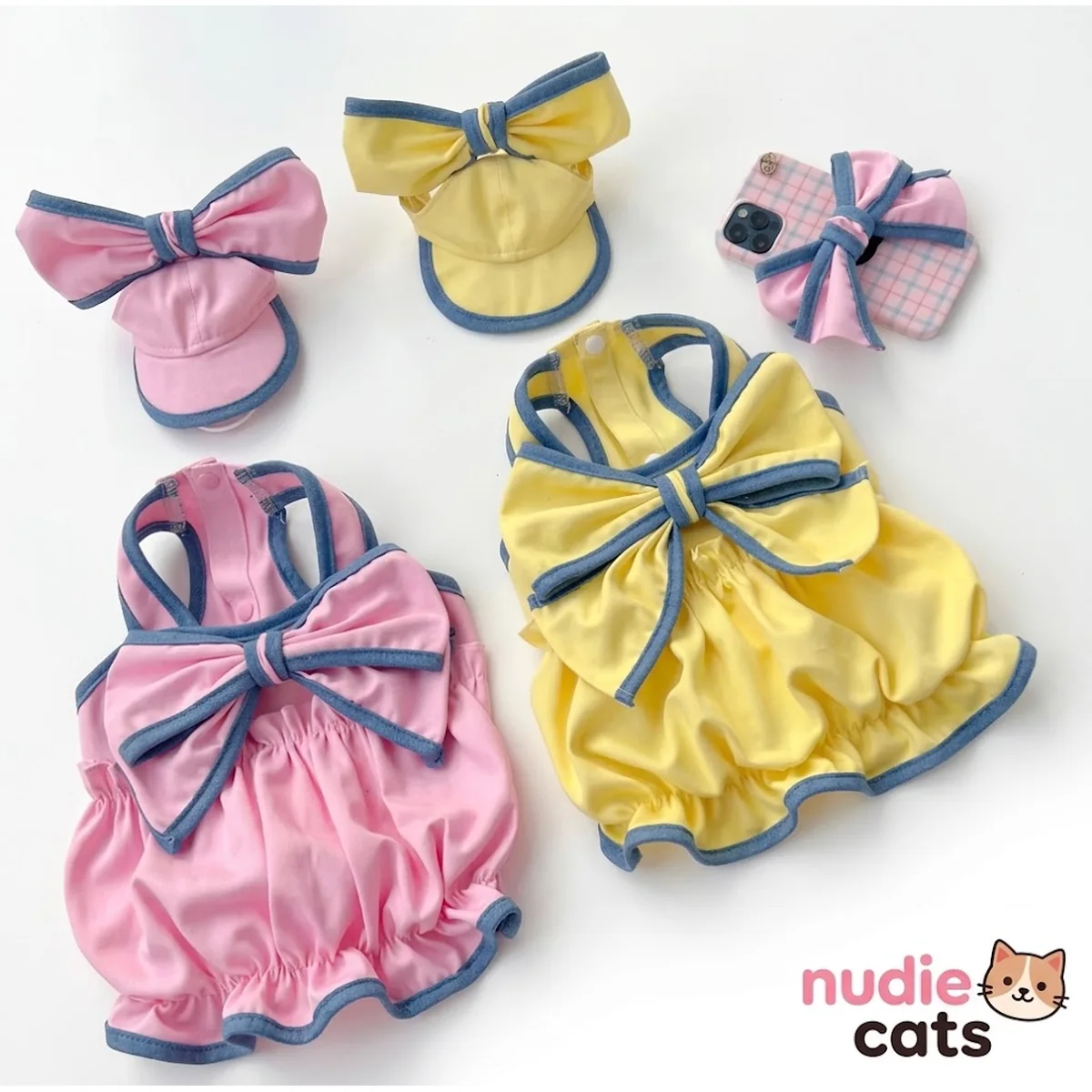 Pink Lemonade and Sunshine Pop Big Bow Summer Cat Dresses displayed together on a white background